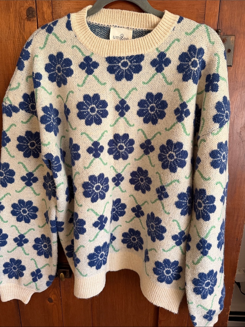 Umgee Cream Knit Sweater with Navy Floral Pattern
